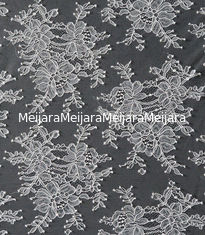China 150cm Width Nylon Lace Fabric White Flower Design For Dress supplier