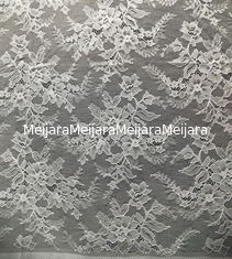 China Flower Design Pattern Nylon Corded Jacquard Lace Fabric By The Yard supplier
