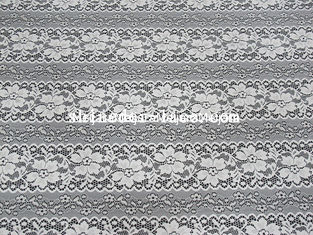 China Delicate Flower Striation Spacing Stretch Lace Fabric With Nylon Spandex Material For Dress SYD-0173 supplier